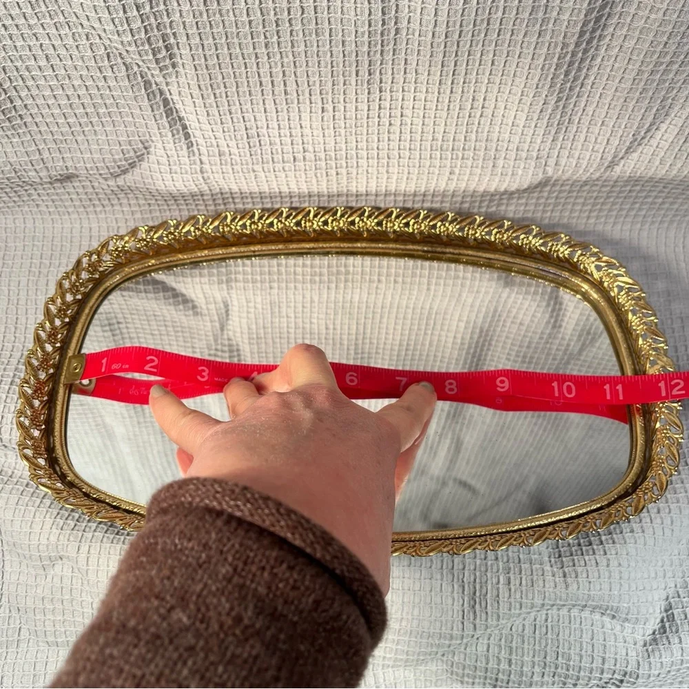 Vintage gold tone filigree vanity mirror